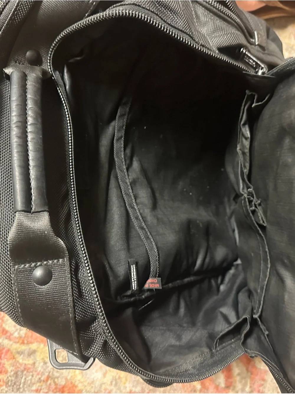 Tumi Black Multi-Compartment Travel Backpack